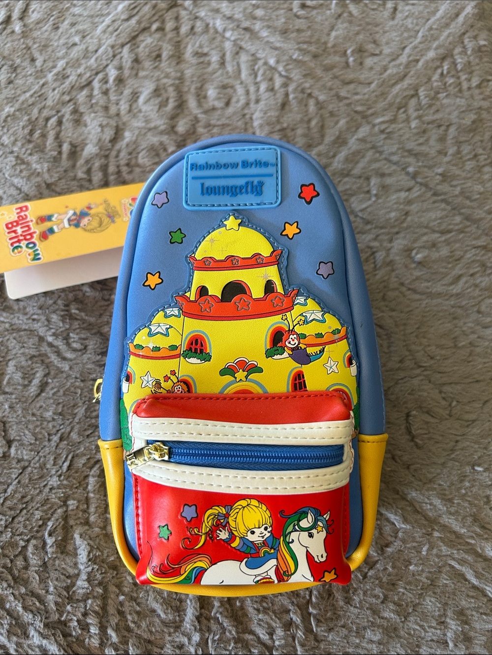 Rainbow Kids Backpack by Rainbow — Blue, Yellow, Red